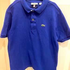 Lacoste kids polo shirt. Size 12 Blue color